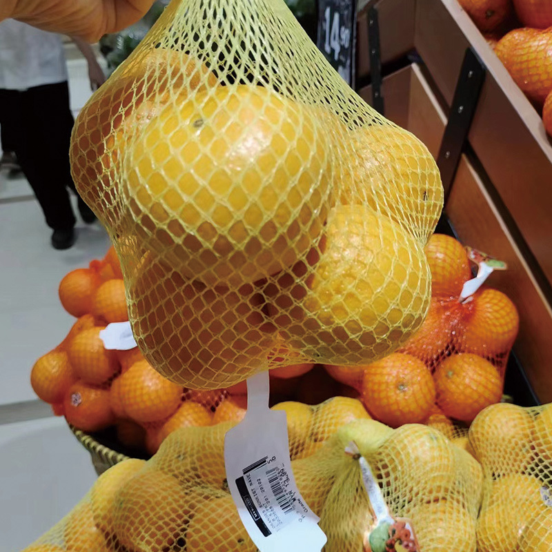 मल्टीहेड वेइजर अनार नेट बैग क्लिपिंग मशीन अदरक प्याज लहसुन मेश बैग पैकेजिंग मशीन