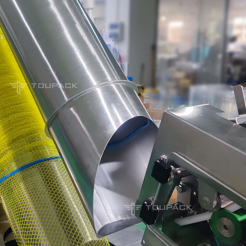 अर्ध स्वचालित मूंगफली नारंगी फल और सब्जी आलू लहसुन प्याज जाल नेट बैग बैगिंग मशीन